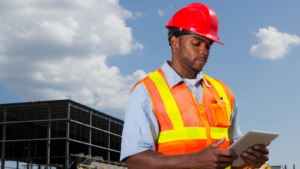 Construction worker using a tablet